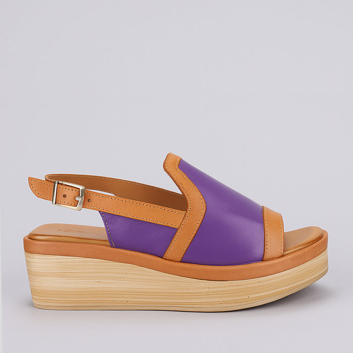 Le Sansa Trozan purple tan sandals with open toe design and ankle strap, featuring stylish casual footwear for warm weather.