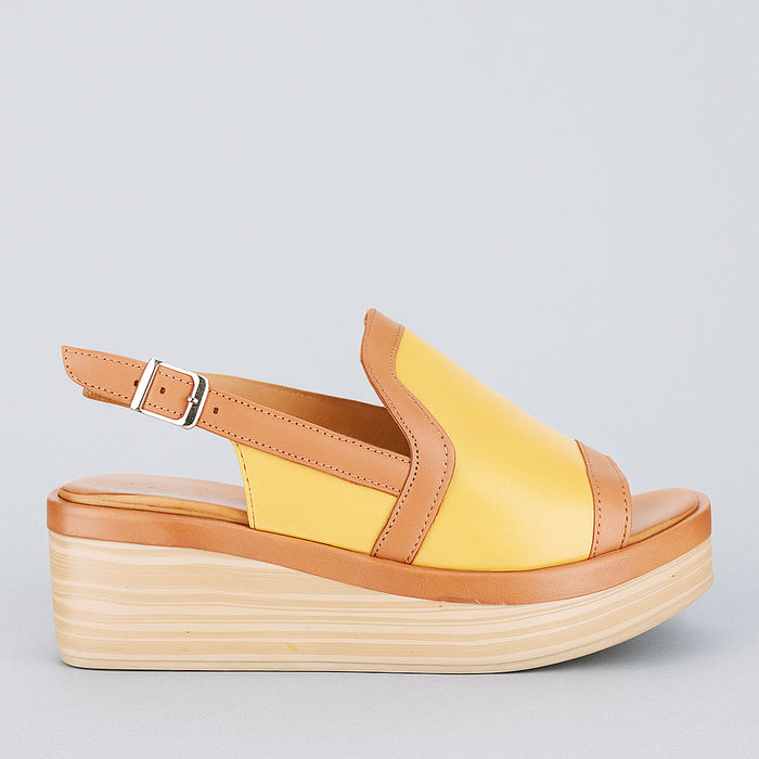 Le Sansa Trozan yellow tan sandals featuring comfortable straps and stylish design, ideal for casual wear.