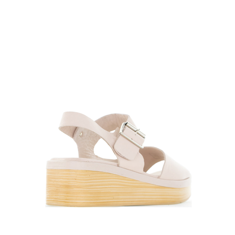 Le Sansa True Cameo sandals featuring beige straps and a comfortable flat sole, ideal for casual summer wear.