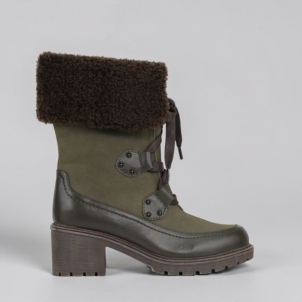 LOS CABOS Tashi Khaki boots outdoors, featuring rugged design and khaki color with sturdy soles and stylish ankle height.