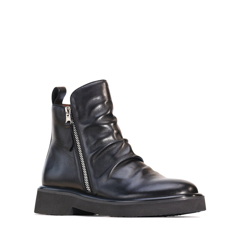 Eos Theona black boots with ankle-high design, sleek leather finish, and stylish lace-up front.