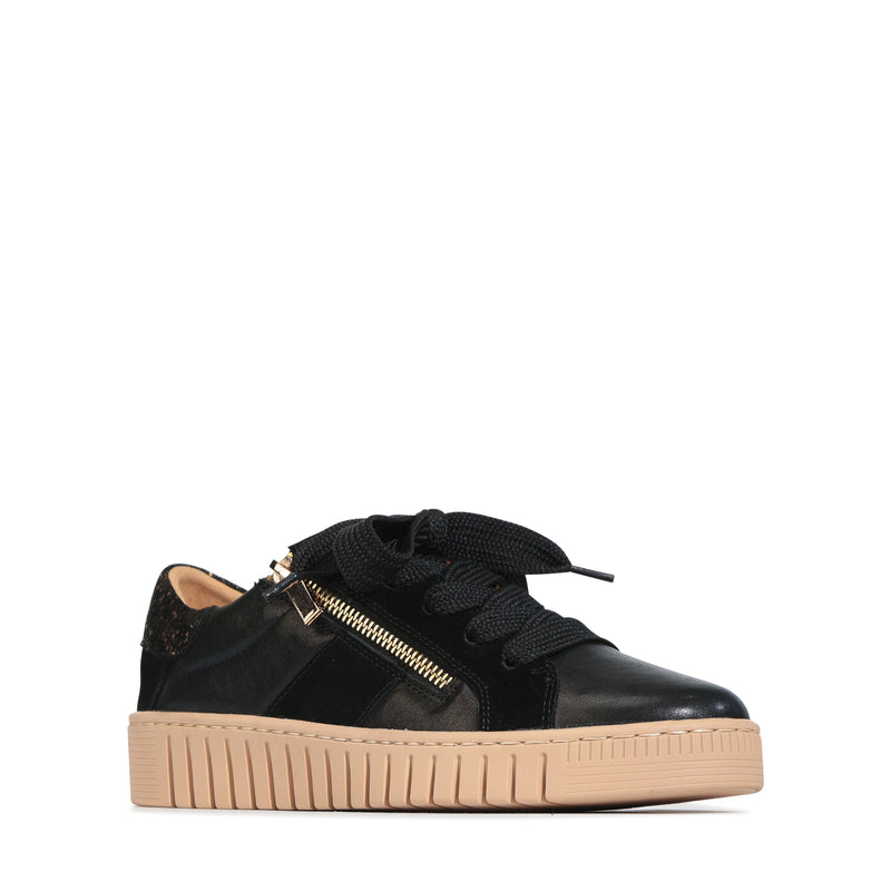 Eos Tinah Goldmarble sneakers with gold marble pattern, featuring stylish athletic footwear and white soles.
