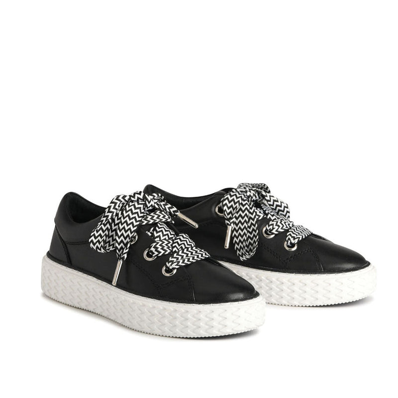 Eos Trinsic black sneakers with sleek design, featuring a modern silhouette and comfortable fit, ideal for casual wear.