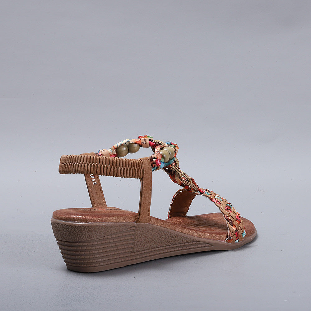 CC Resorts Ursa Tan sandals with tan leather straps and cushioned soles, displayed on a neutral background.