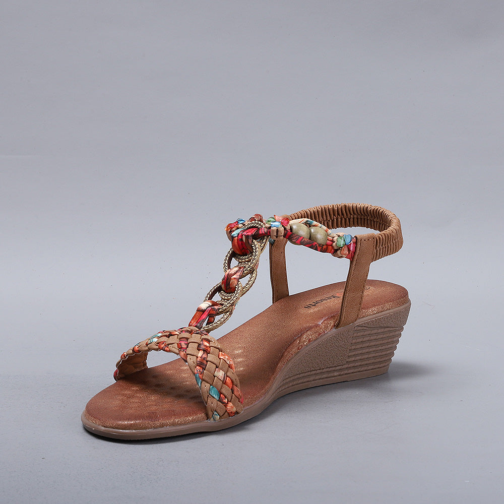 CC Resorts Ursa Resort sandals, tan-colored slip-on footwear with comfortable straps and stylish design.