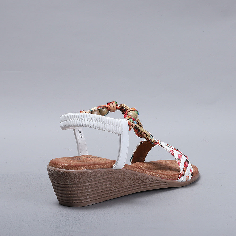 White CC Resorts Ursa sandals with open toe design and ankle straps, displayed on a neutral background.
