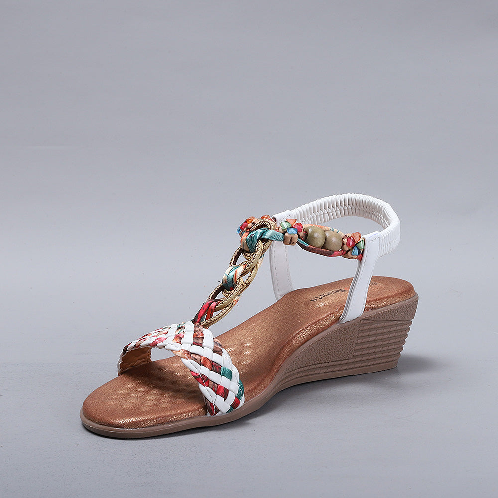 CC Resorts Ursa white sandals with open toes and ankle straps, displayed on a neutral background.