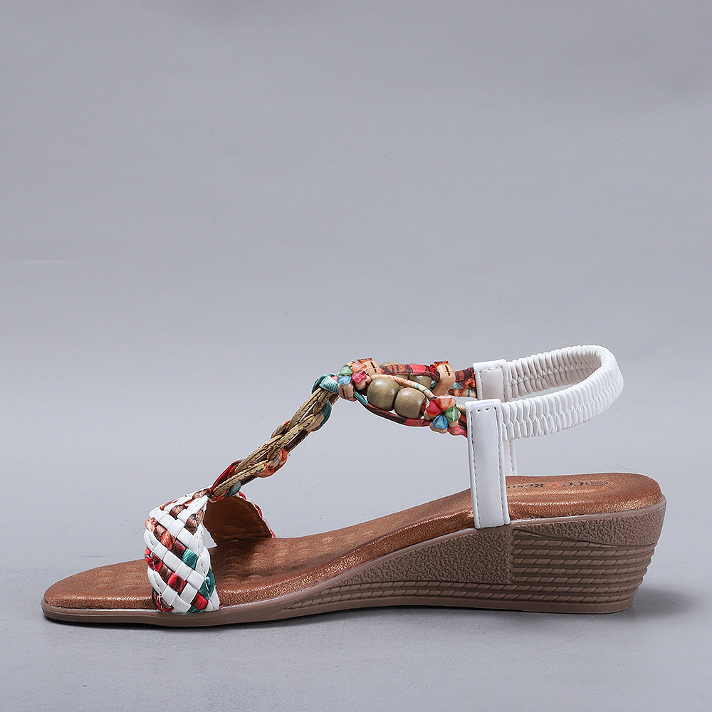 CC Resorts Ursa White sandals with open toes and ankle straps, featuring a sleek white design perfect for casual summer wear.