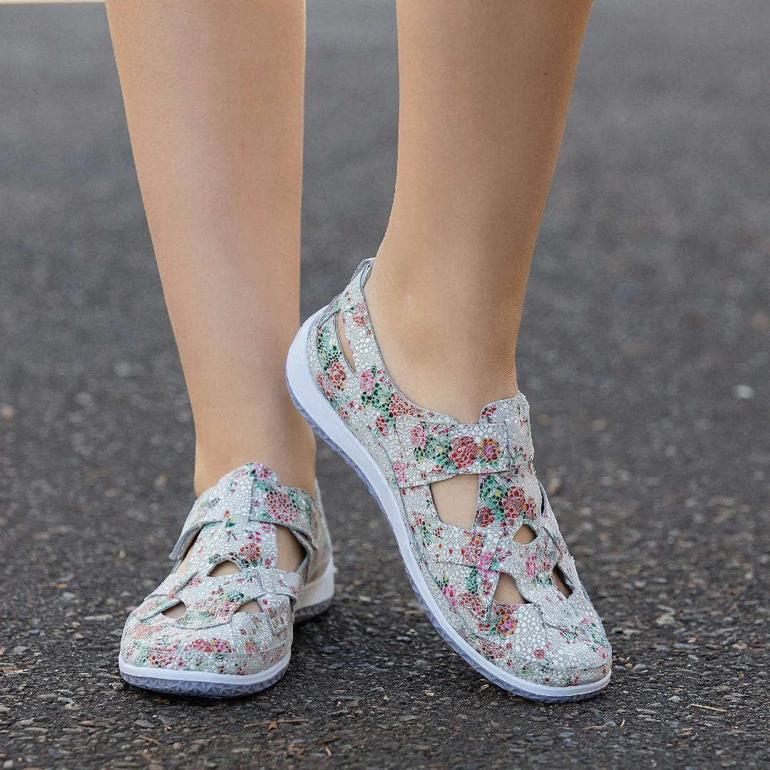 CC Resorts Jackie white and green floral flats with a woven design, perfect for casual warm-weather wear.