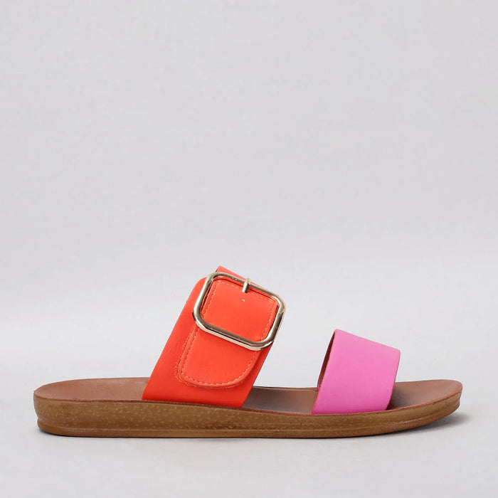 VS Treads Velma flats in fuchsia and orange shown from the side, featuring a sleek design and vibrant color combination.