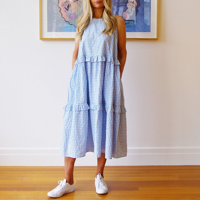 Light blue sleeveless dress from Who's Charlie Rosie collection, featuring a casual, stylish design with a relaxed fit.