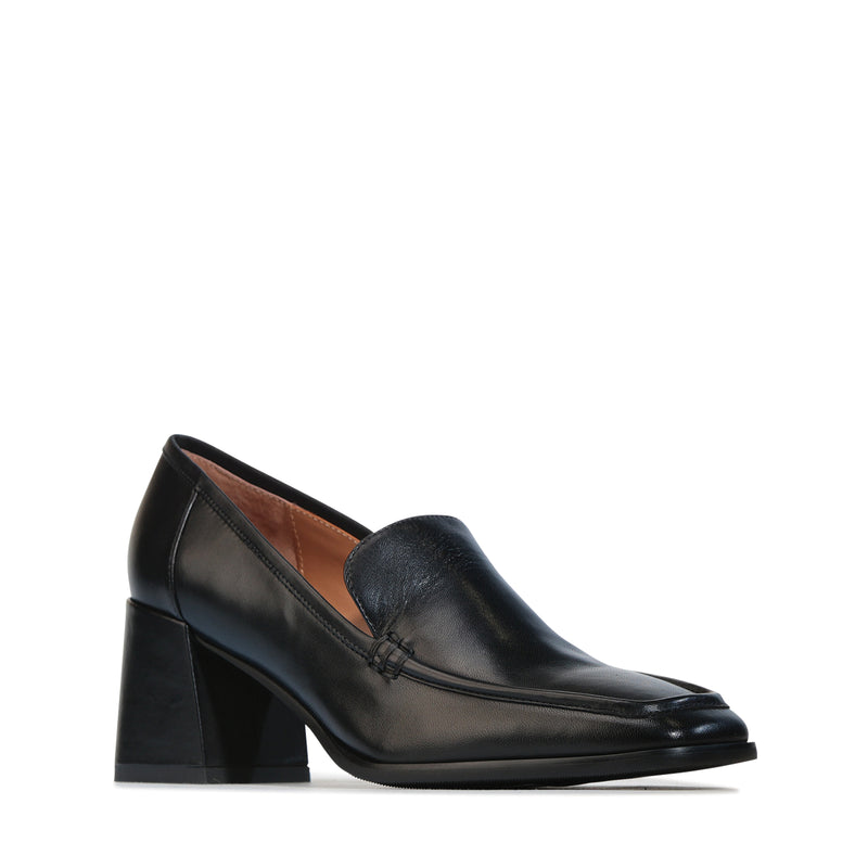 Elegant black EOS VERDE heels featuring sleek design and pointed toes, perfect for stylish occasions.