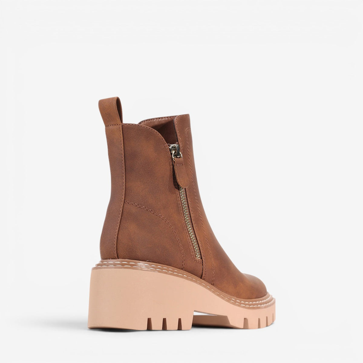 Pair of stylish boots inspired by Los Cabos Vianne Brandy, featuring a sleek design and premium leather finish.