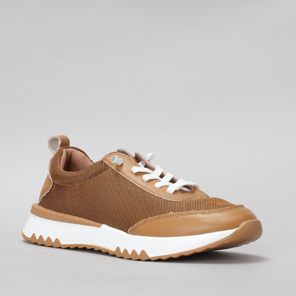 CC Resorts Walky Tan sneakers featuring a casual tan design and comfortable slip-on style.