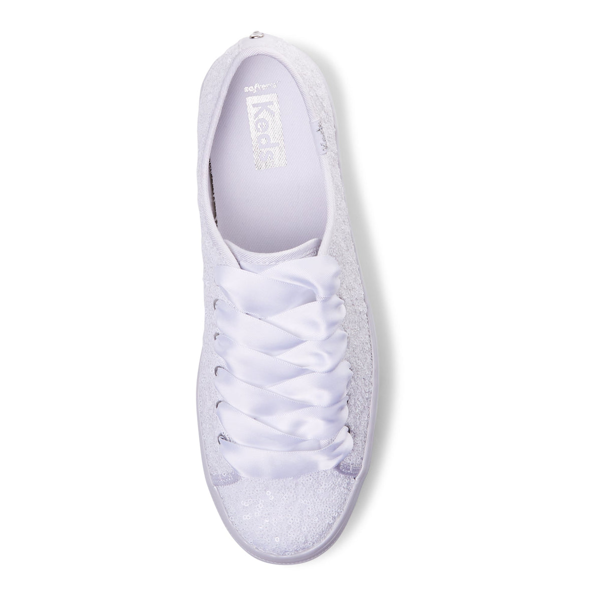 KEDS Triple Up Sequin Cel white sneakers with sparkling sequins and white soles, showcasing stylish casual footwear.