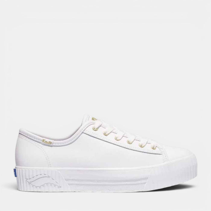 White KEDS Triple Kick Amp casual sneakers with leather uppers, featuring classic design and rubber soles.