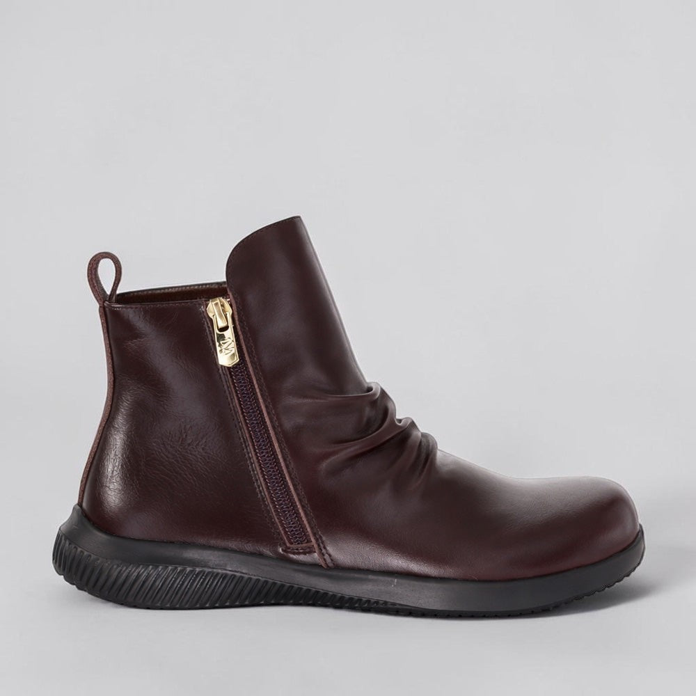 Naked Arches Yila Wine boots with rounded toe and block heel, featuring a sleek wine-colored leather finish.