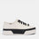 KEDS Triple Up women's sneakers in white and black leather with fox stripe detailing and bumper design.
