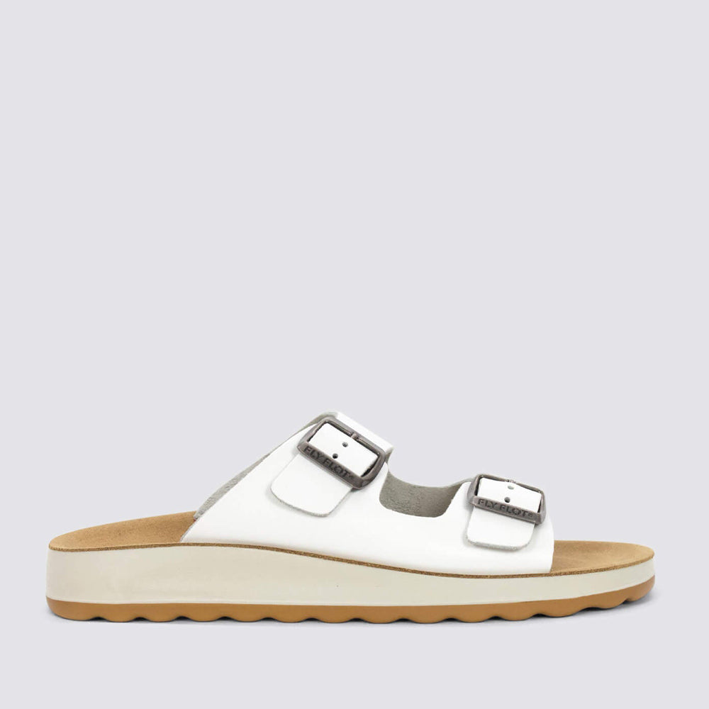 Fly Flot flats in white, featuring a sleek design with comfortable straps and a flat sole, perfect for casual wear.