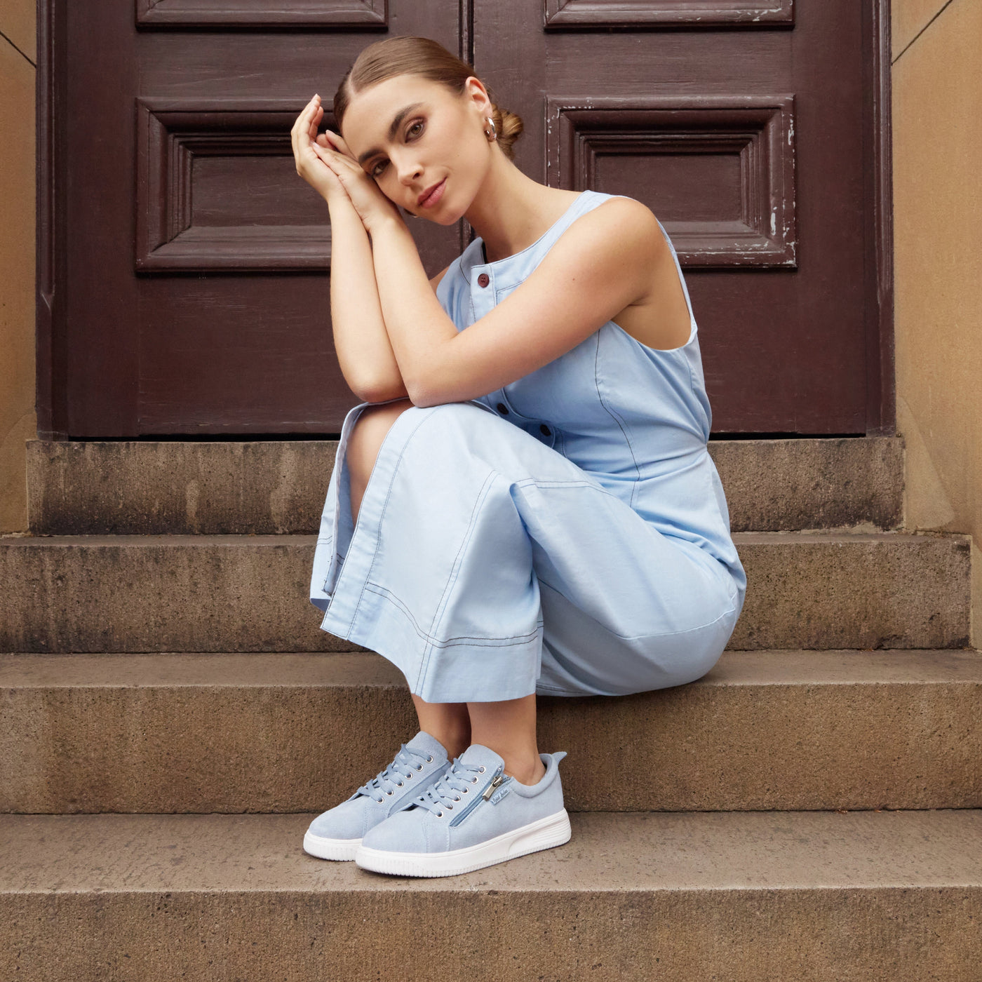 Naked Arches Nelly denim sneakers featuring a stylish denim upper and white rubber sole, designed for casual winter wear.