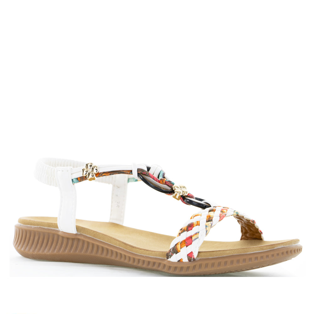 Pair of white CC Resorts Xtra sandals with cushioned straps and flat soles, perfect for casual summer wear.