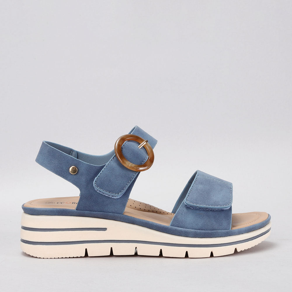 CC Resorts Yarra denim sandals with ankle straps and open toes, displayed on a neutral background.