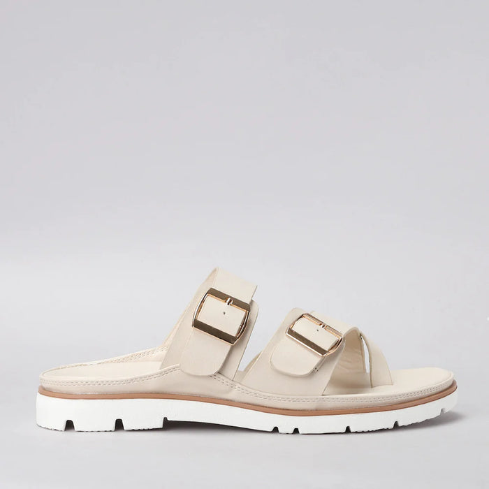 CC Resorts VS Treads Yen beige flats with side view, featuring a sleek design and comfortable slip-on style.