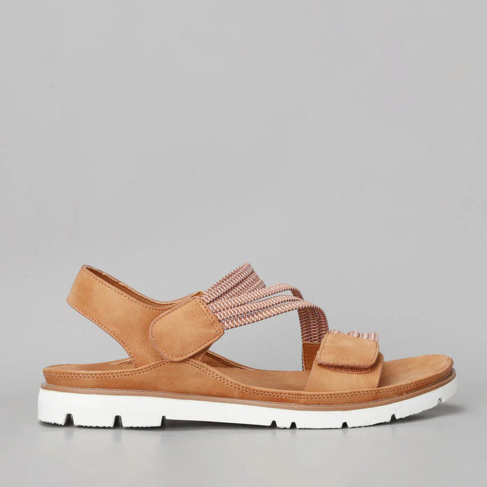 VS TREADS Yurra tan sandals, side view showing open toe design and ankle strap, made of tan leather for casual wear.