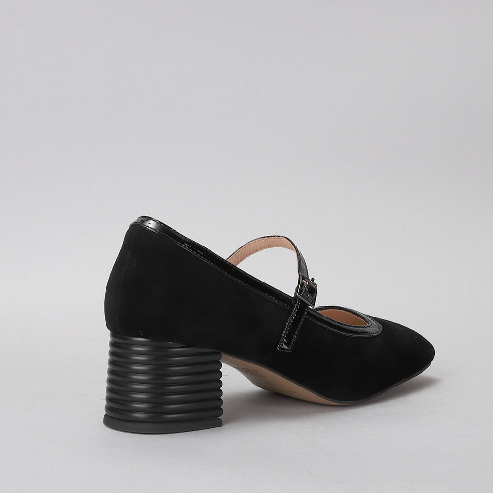 Black suede heel shoes from Le Sansa Zafira collection, showcasing sleek design and elegant heel height.