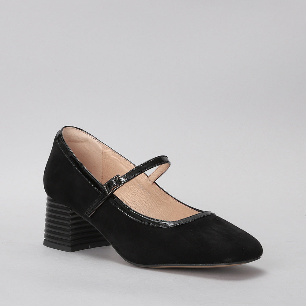 Le Sansa Zafira black suede heels with a sleek design, pointed toes, and stiletto heels, perfect for elegant occasions.