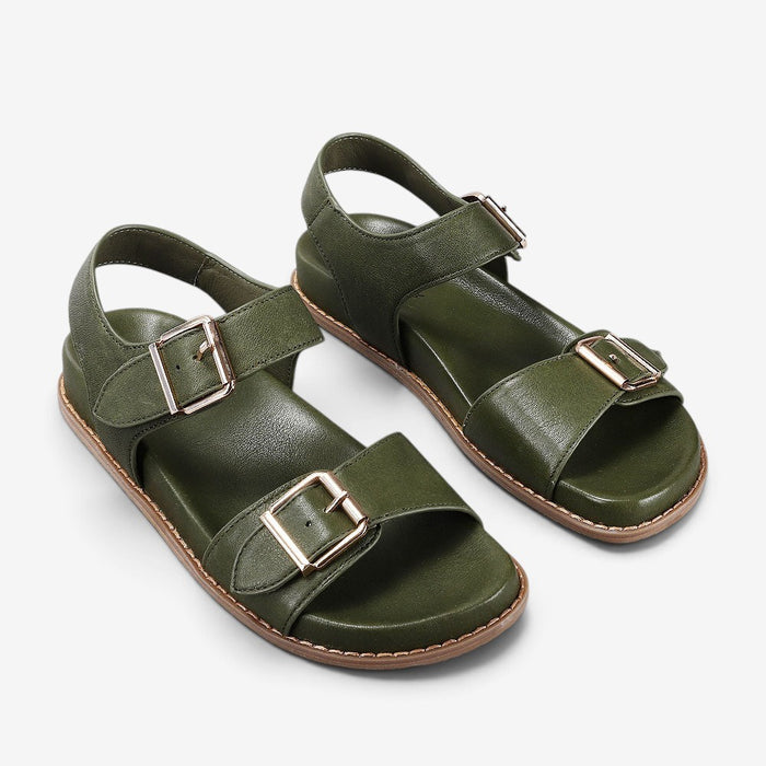 Naked Arches ZIGGRO DK OLIVE sandals featuring a strappy design and olive green color, displayed on a neutral background.