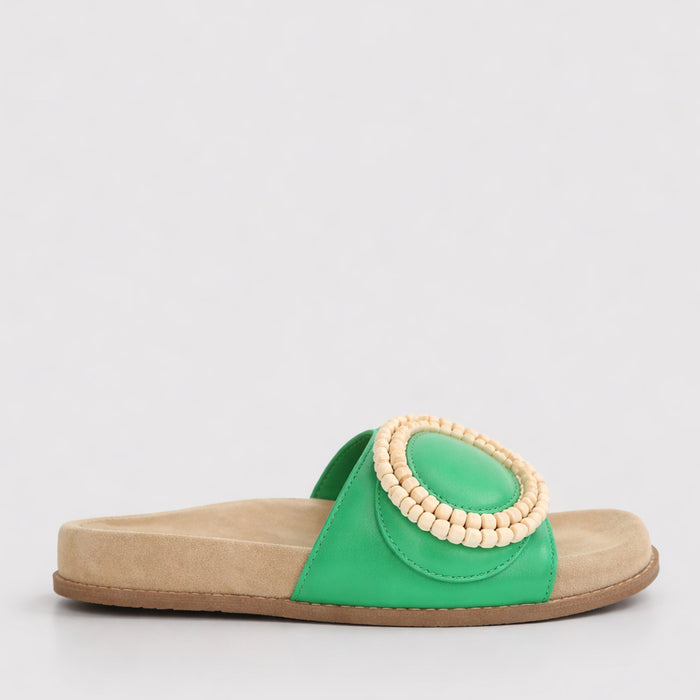 Naked Arches Zoya Fern Green slip-on shoes with a vibrant green fabric upper and comfortable casual design.