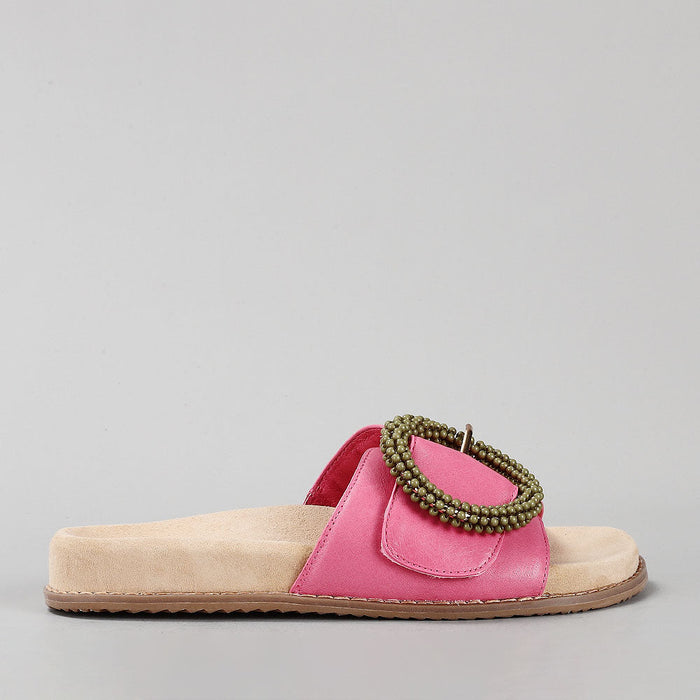 Naked Arches Zoya hair slip-ons with sleek design, featuring a side view of the stylish footwear on a neutral background.