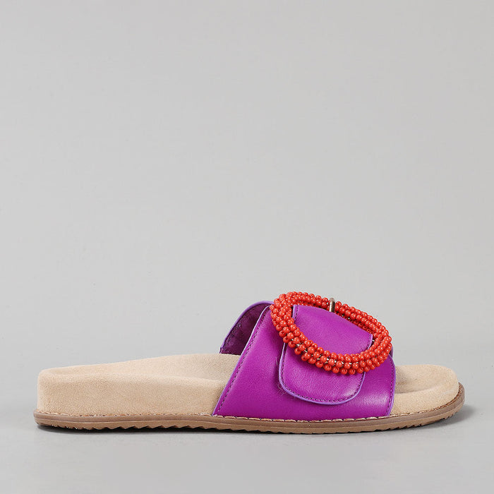 Naked Arches Zoya Purple slip-on shoes with pointed toes and sleek design, displayed from a side view.