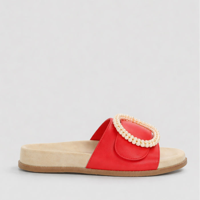 Naked Arches Zoya Red slip-on shoes with sleek design and vibrant red color, perfect for casual or stylish wear.