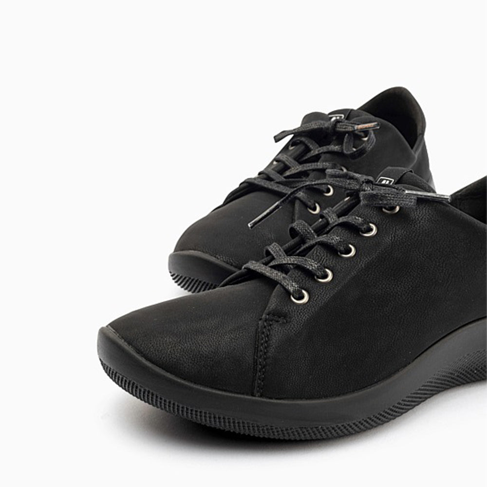 Black Arcopedico Daintree sneakers with breathable fabric and comfortable sole, stylish for casual wear.