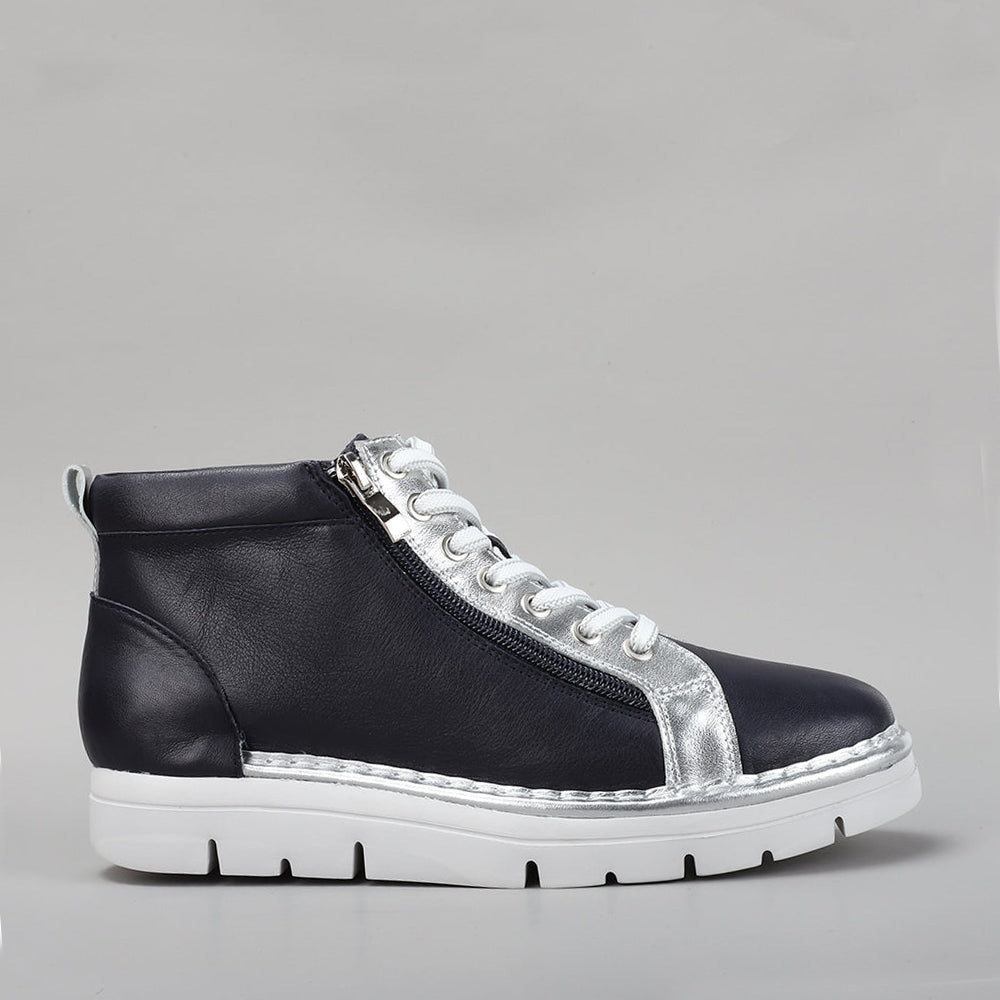 Le Sansa Bobby navy silver boots with stylish design and silver accents, shown on a neutral background.