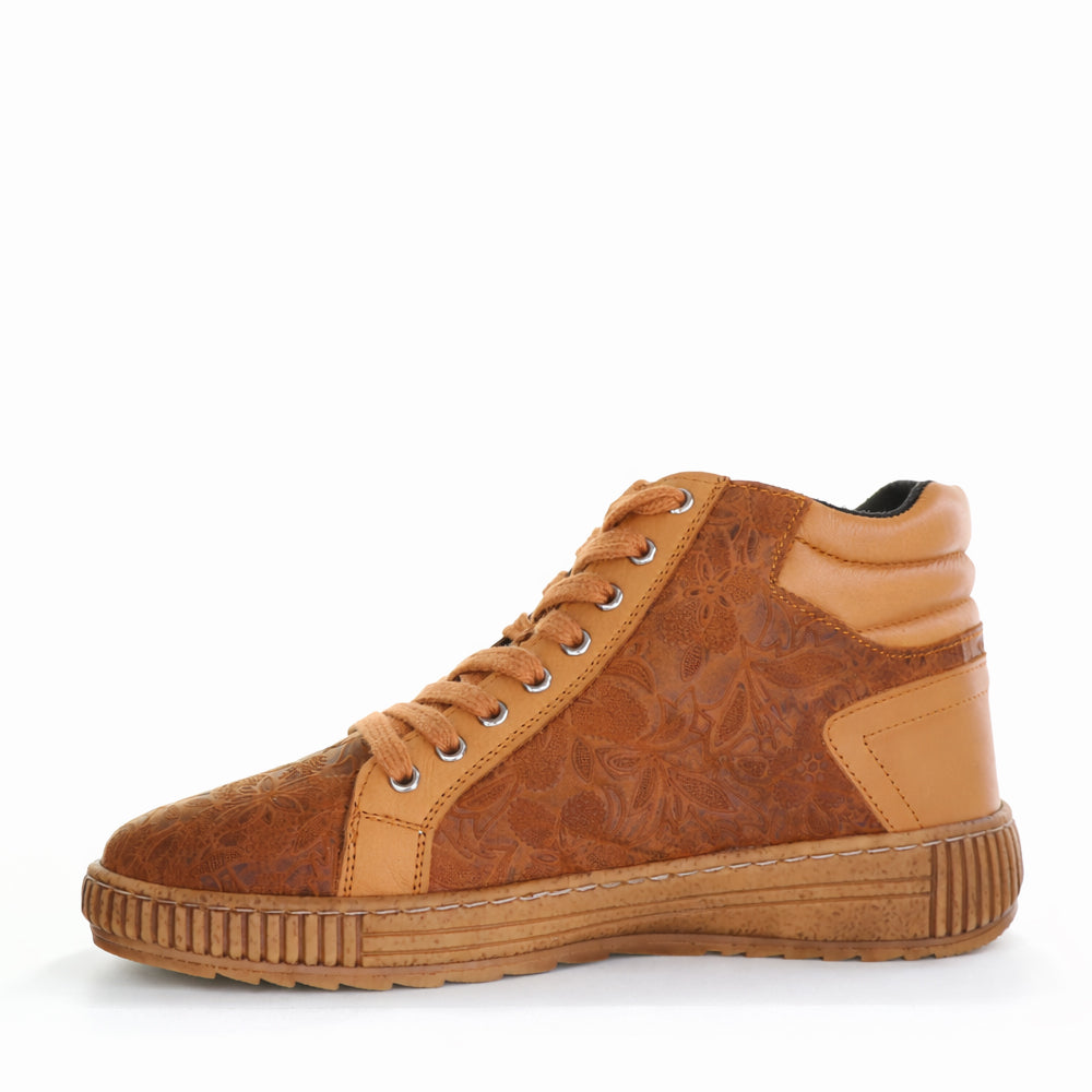 CABELLO Boho Tan boots featuring ankle-high design, soft leather, and stylish bohemian-inspired details.