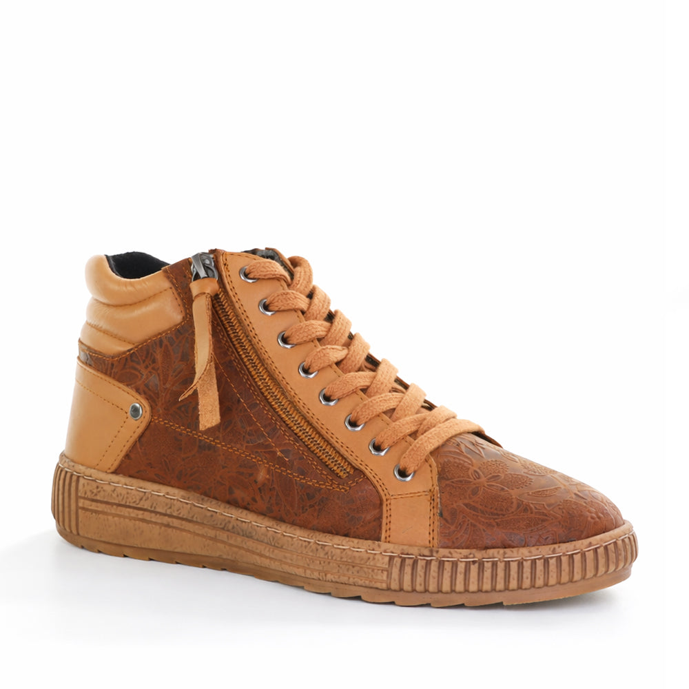 CABELLO Boho Tan boots with ankle-high design, tan leather, and decorative stitching, perfect for casual or bohemian style.