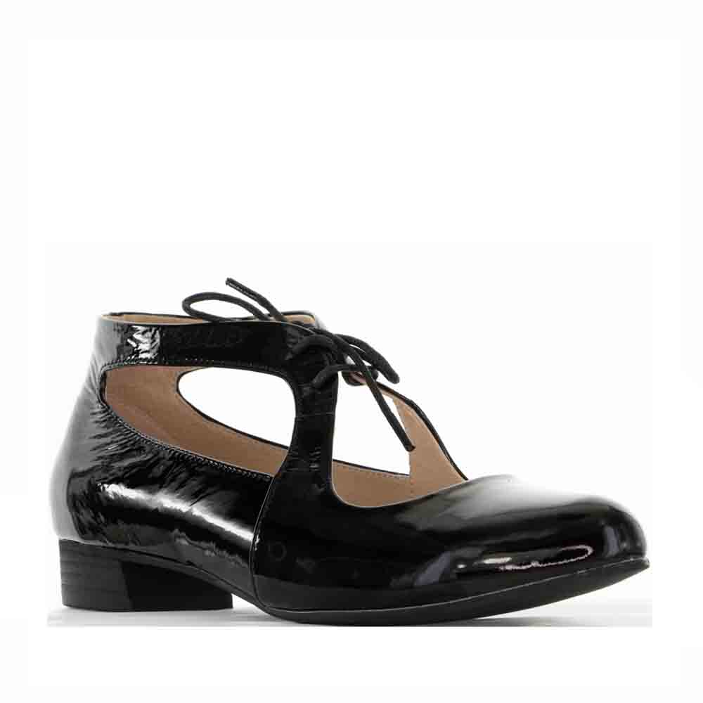 Black patent LE SANSA BOSS sandal with sleek straps and flat sole, displayed on a neutral background.