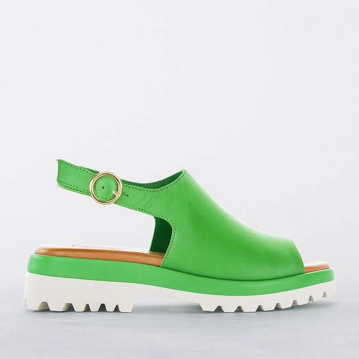 Le Sansa Briar Fern green sandals with braided straps and open-toe design, perfect for casual summer wear.