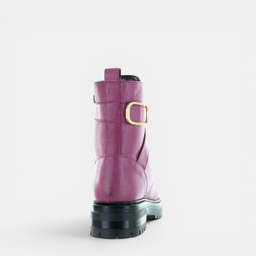 Hot pink LE SANSA Cameran boots with chunky soles and ankle height, stylish and vibrant footwear for bold fashion statements.