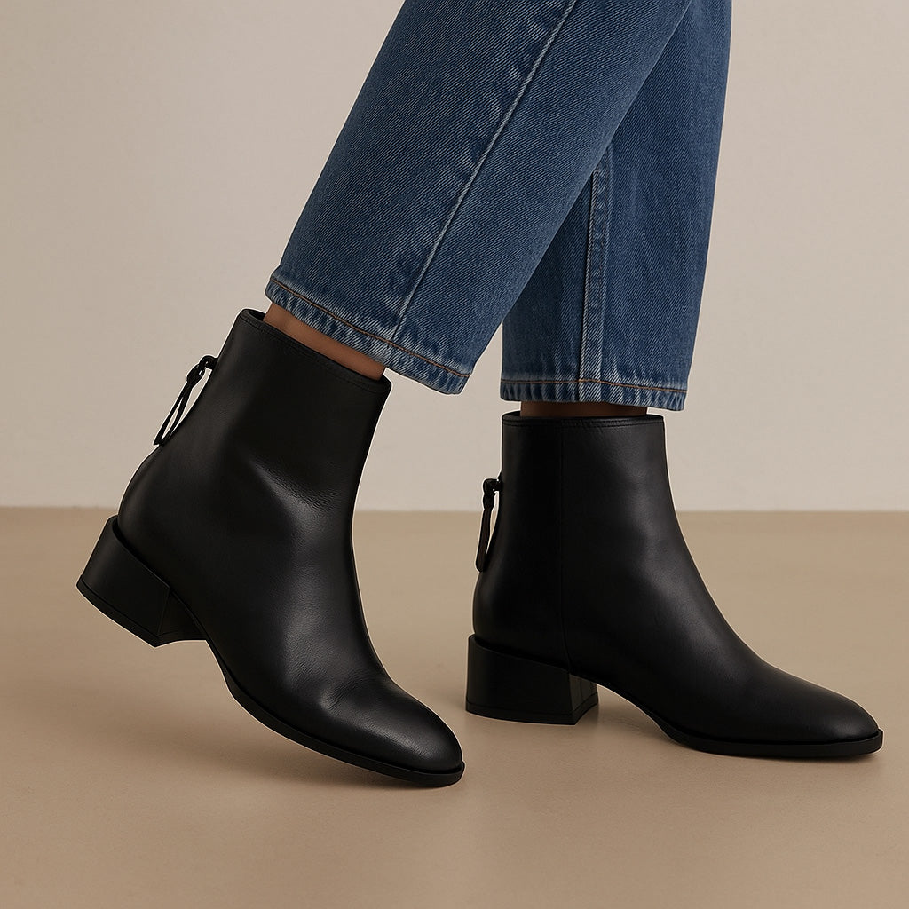 Eos Cast Black boots with a sleek black design and sturdy construction, showcasing style and durability.