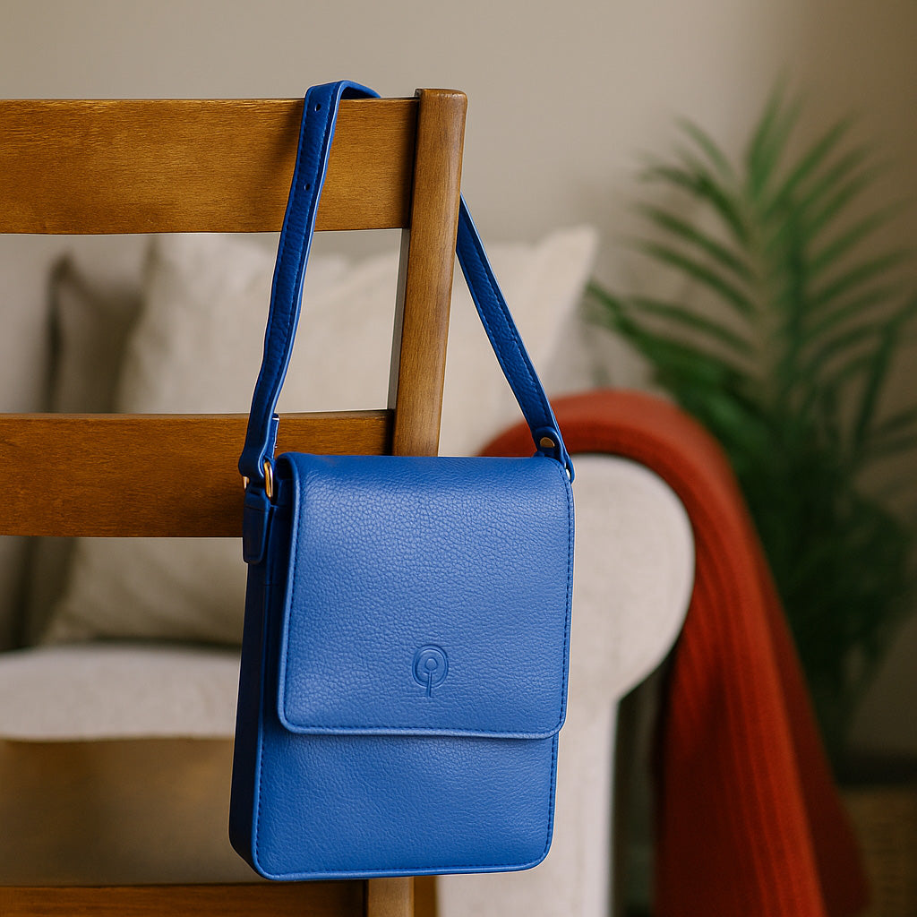 Second Nature CB6 cobalt handbag with sleek design, featuring sturdy handles and a vibrant blue color.