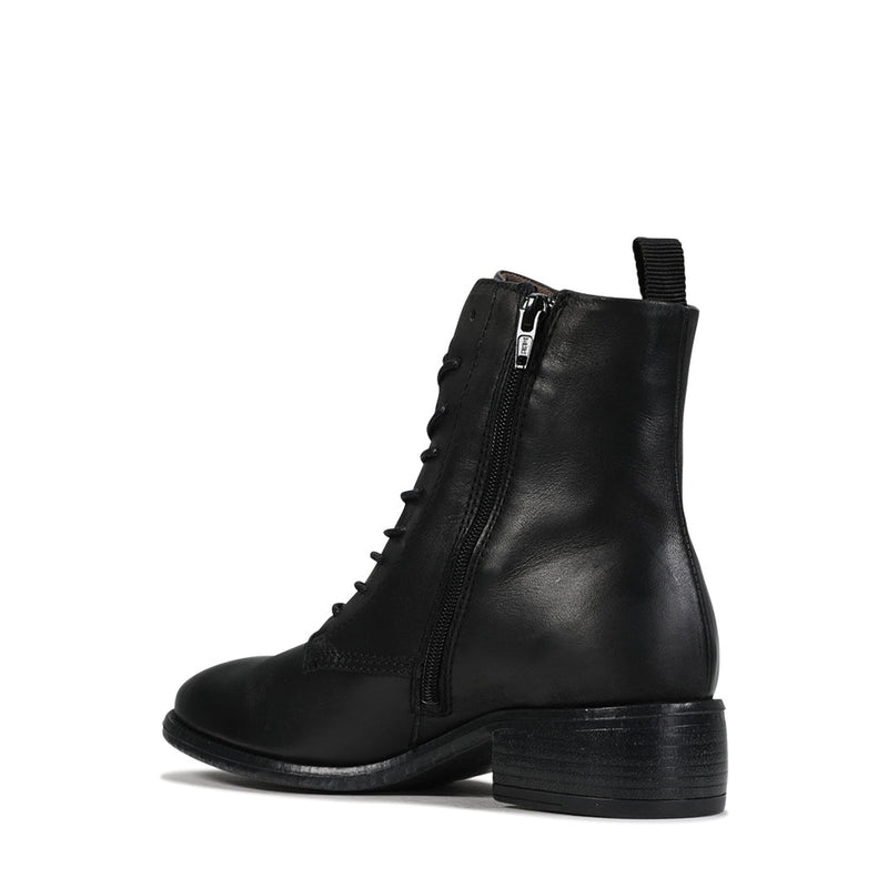 Black EOS Celia ankle boots with a sleek design and lace-up front, perfect for stylish everyday wear.