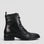 Black EOS Celia ankle boots with sleek design and rounded toes, perfect for stylish casual or dressy wear.