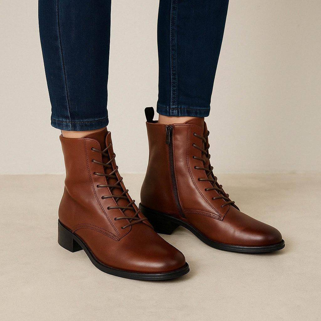 EOS Celia Brandy boots, stylish ankle boots in tan leather with a rounded toe and low heel, perfect for casual or office wear.