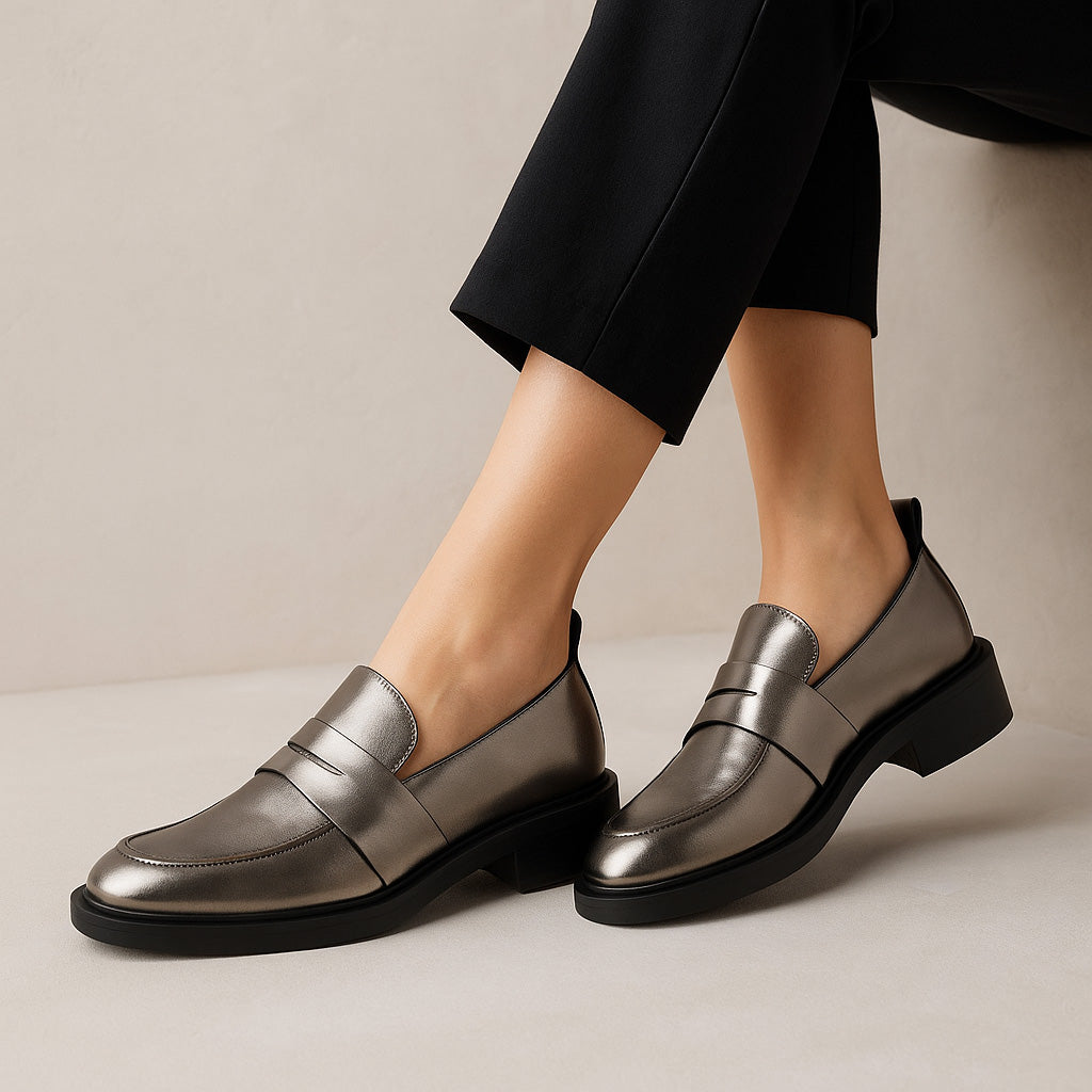 Eos Coia Pewter Metal Loafers with sleek design and metallic finish, showcasing stylish footwear for casual or formal wear.