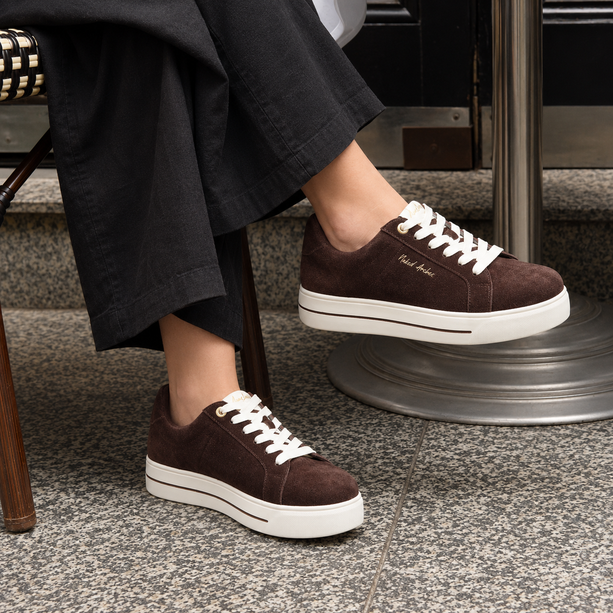 Naked Arches Azealia Choco sneakers with chocolate brown and beige color blocking, casual low-top design, and stylish laces.