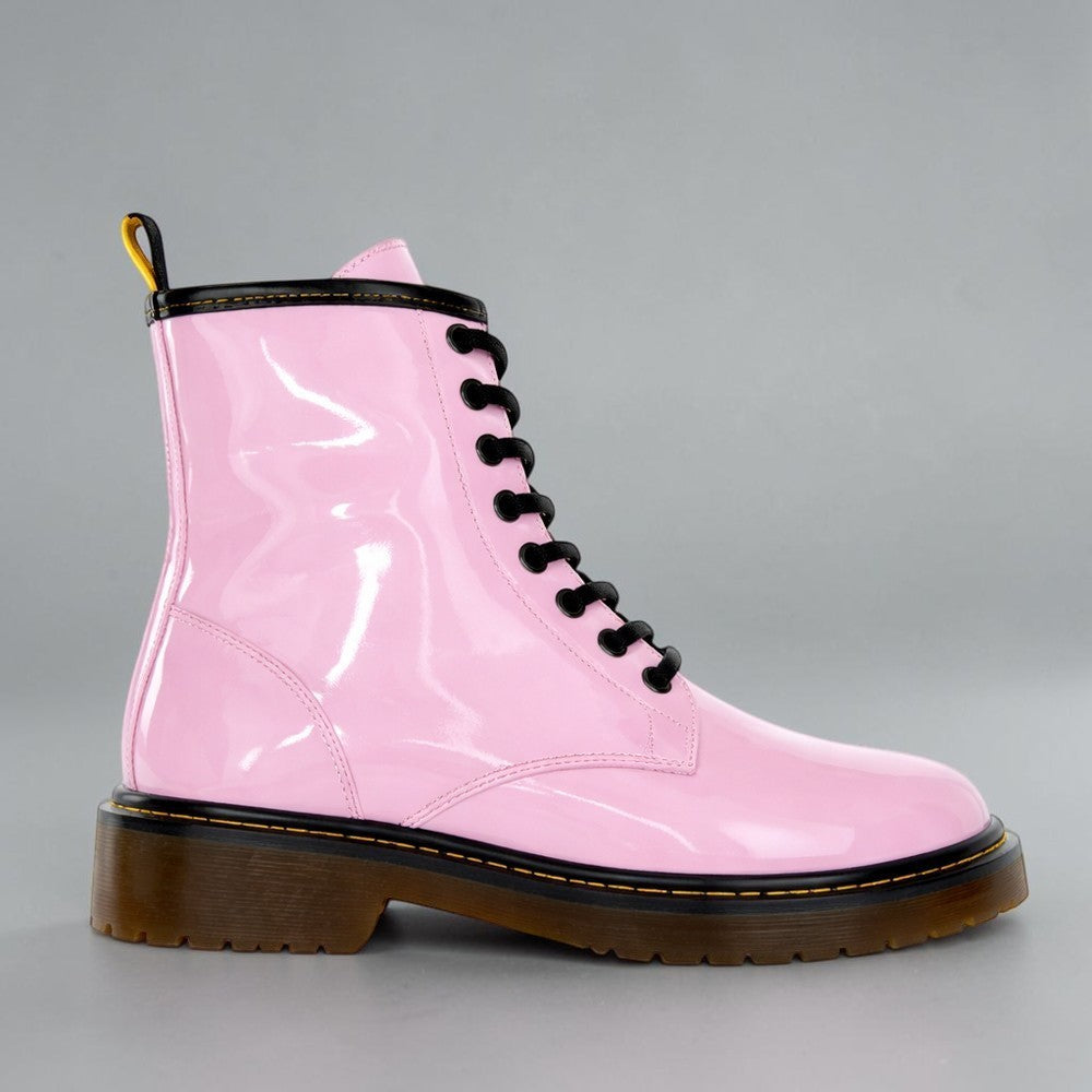 LE SANSA Depth Candy Patent Boots featuring chunky soles and sleek, glossy black finish with stylish lace-up design.